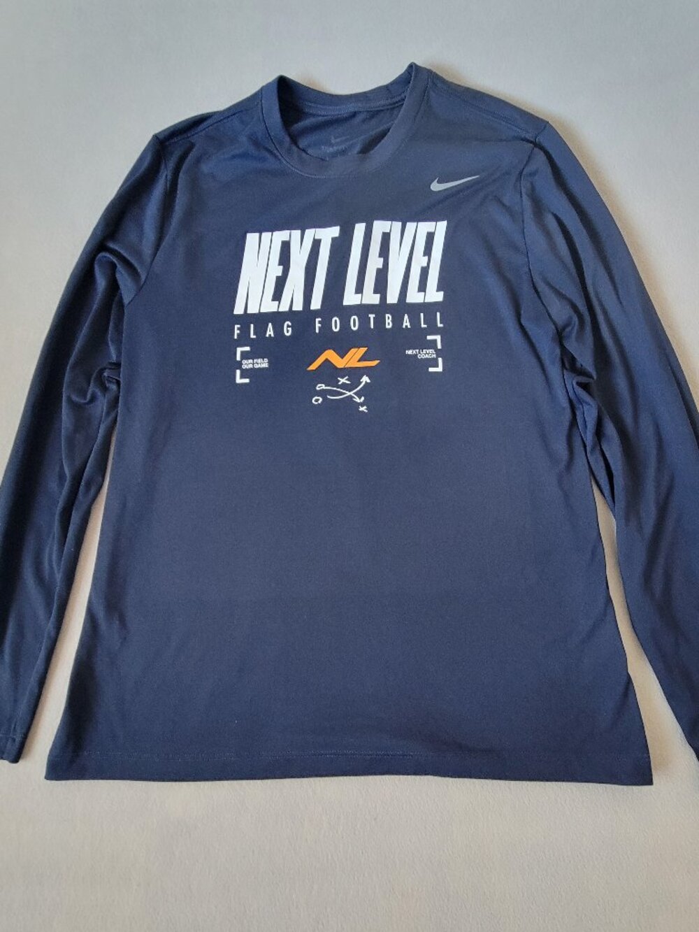 NIKE DRI-FIT NEXT LEVEL FLAG FOOTBALL LONG-SLEEVE PERFORMANCE TEE – MEN’S LARGE